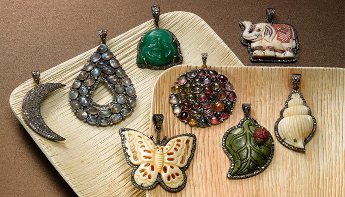 Unique pendants with carved stones, diamonds and Jade